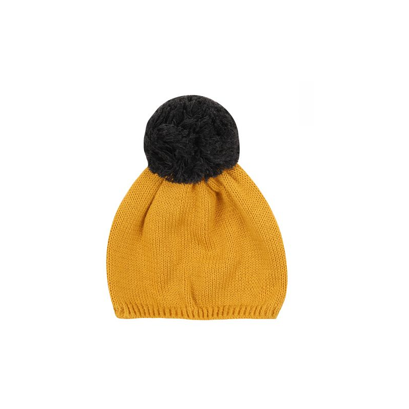 yellow hat with pom pom